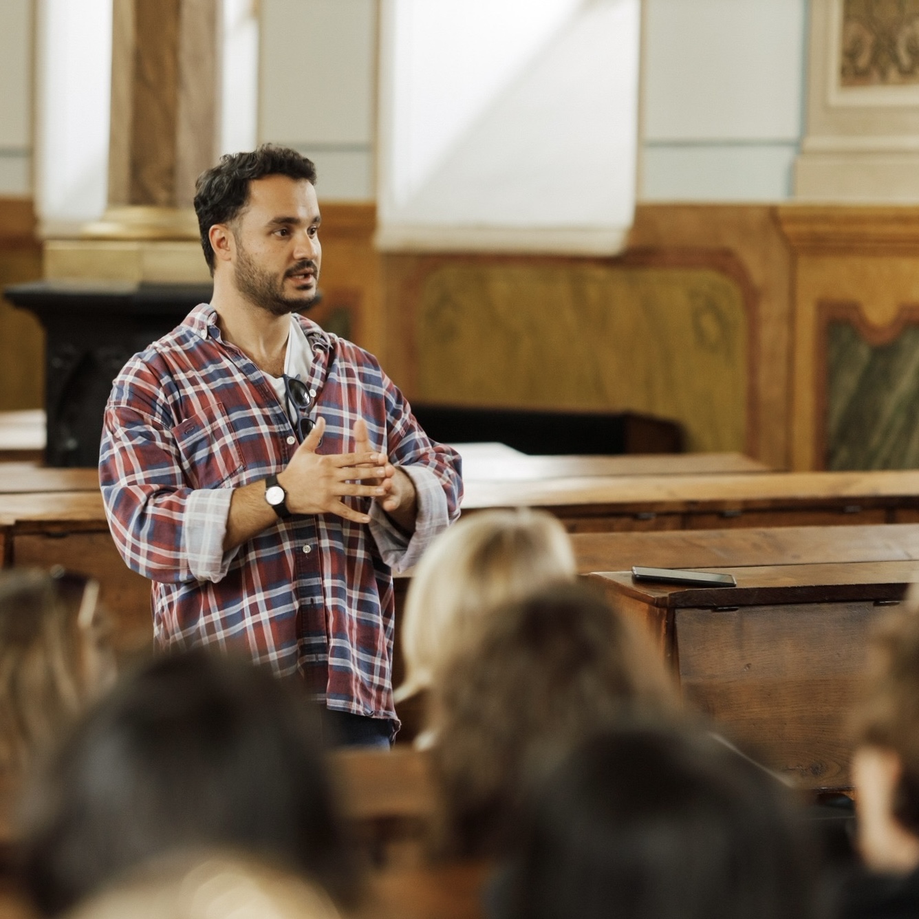 A lecture in an intimate library setting